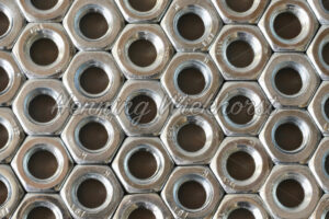 Hintergrundmuster aus Schraubenmuttern - ImageShop