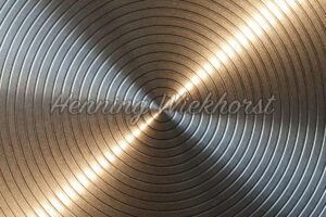 Lichtreflexionen auf einem Drehteil mit Rillen - ImageShop