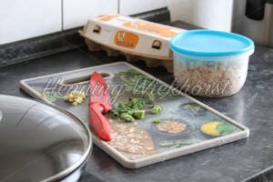 Schnittlauch auf dem Schneidebrett - ImageShop Online